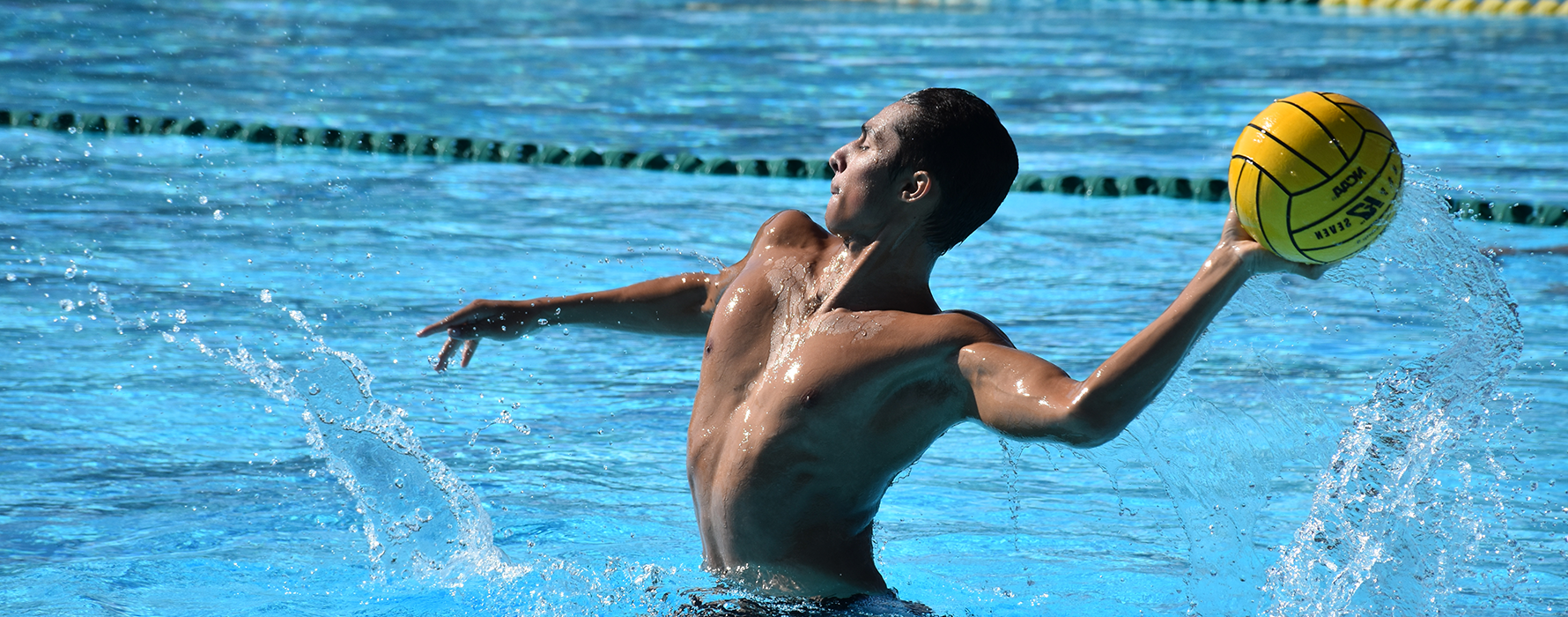 Water polo player throwing ball